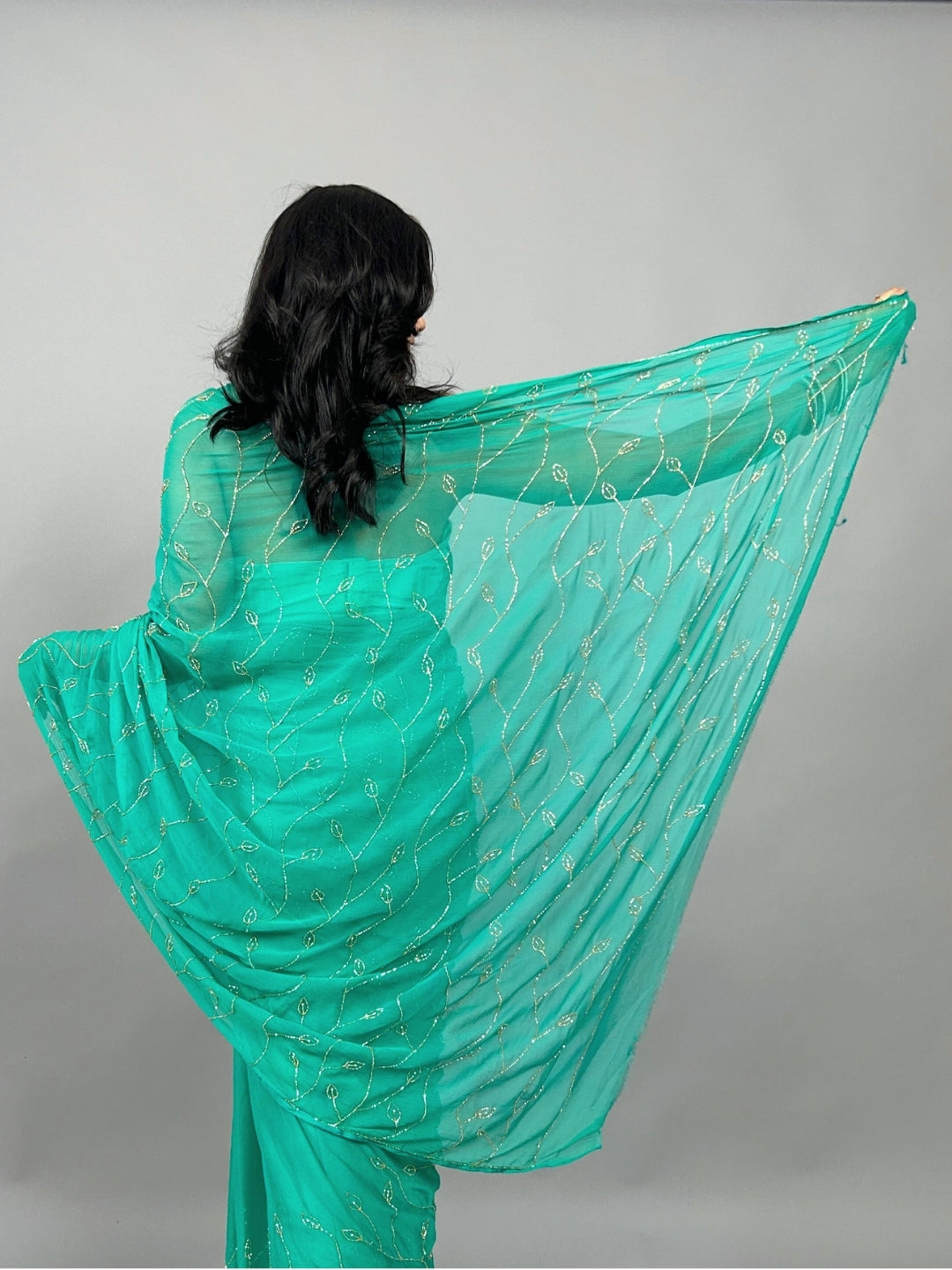 Raina- Teal